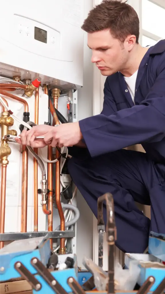 Gas Safe registered engineer performing a boiler installation in Norfolk home